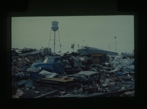 "Looking SE over rubble at Swartzendrubers Weld Shop" Graham, Duane A., Oatman, Emily, and Graham Productions, “Graham Slide 3-14-90 #017,” Hesston Public Library, accessed March 13, 2015, http://hesston.digitalsckls.info/items/show/78. 